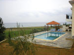 View of the pool and the sea in Argaka, Cyprus