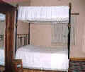 Accommodation in Arsos Cyprus - This is a traditional house with traditional beds. -click to enlarge