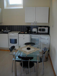 Apartment for holiday let in the centre of Larnaca in Cyprus - kitchen details and dining for 4