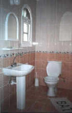 As well as the en-suite bathroom there is a common use bathroom up-stairs and a w.c. downstairs. - click to enlarge.