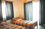 The two twin bedrooms have fitted wardrobes and dressing tables.  - click to enlarge.