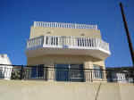 This villa is about 1km from the village of Peyia and 5 minutes drive to the beach at Coral Bay . 