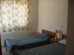 Here is a twin bedroom at this maisonette available for holiday rentals in the Tombs of The Kings area of Paphos.