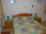 The double bedroom at Donarina in Paphos, Cyprus has air-conditioning.