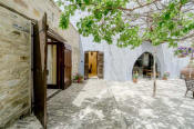 Garden Kamara house Cyprus - delightful courtyard with tree