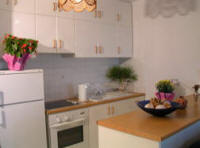 The kitchen in this studio flat at Governors beach in Cyprus is small but sufficient for a pleasant holiday experience