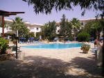 The apartments are built around a central pool and garden area, with a friendly and pleasant pool bar.
