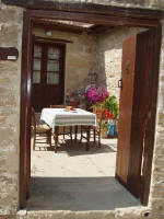 This courtyard in Cyprus is delightful for relaxing in a country courtyard