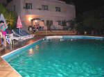 This is the pool at night at C & A apartments in Polis. 