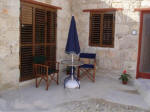 The garden furniture at Villa Neo Chorio accomodates up to 4 people